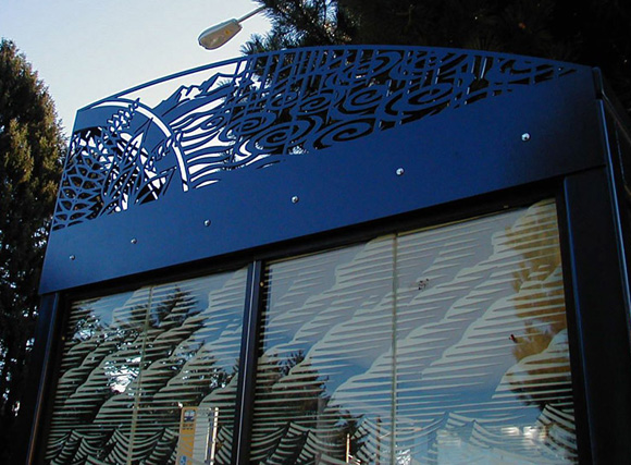 Laser cut steel and fritted glass for King Co. Metro bus shelters